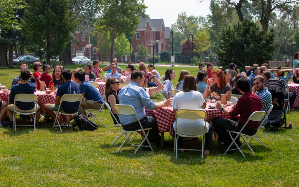 CVRTI Summer BBQ Picture of Staff Members Eating at Tables